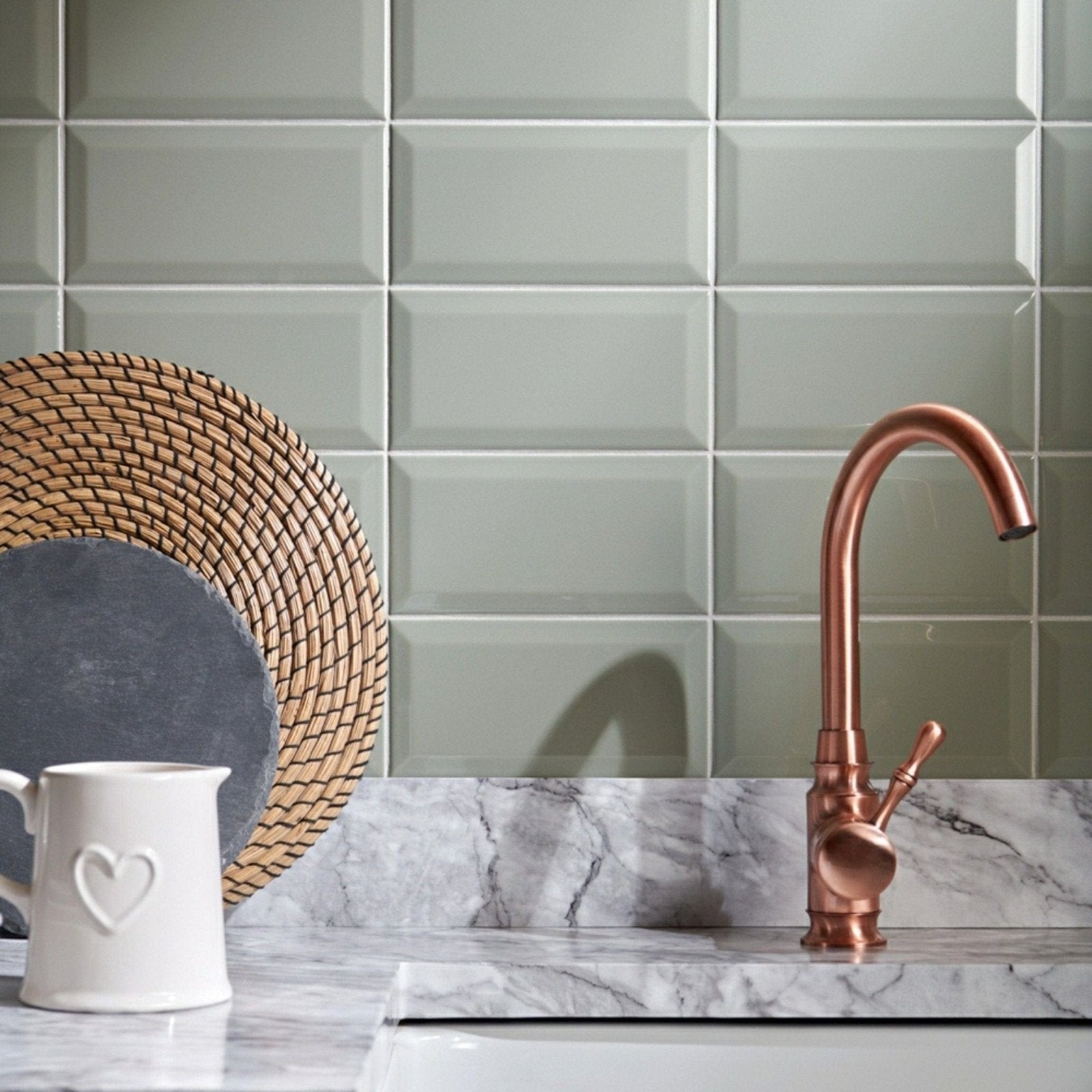 Copper-finished metro sage gloss kitchen faucet with curved spout and single lever handle for easy use