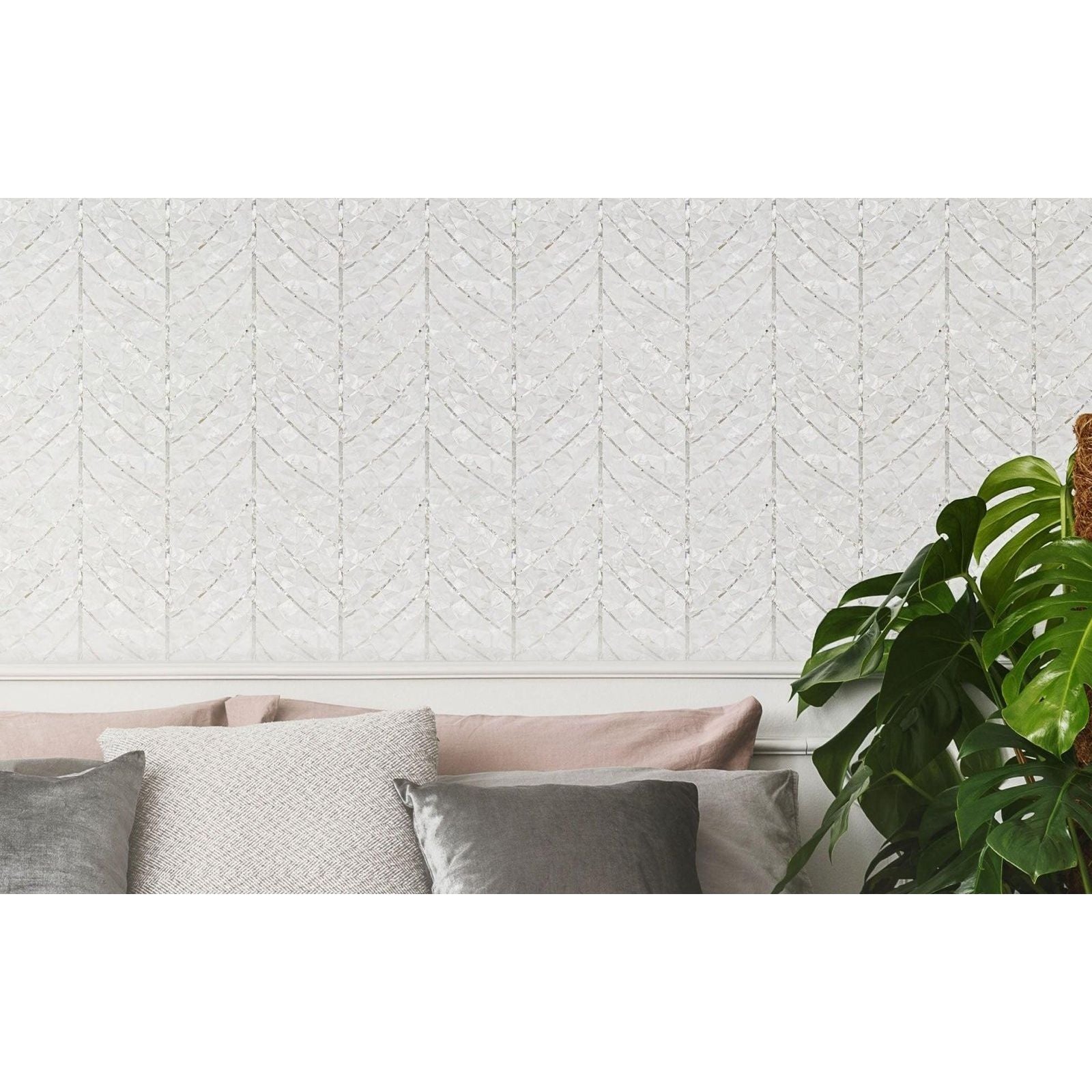 Natures Herringbone white and silver mother-of-pearl herringbone panel with a chevron pattern