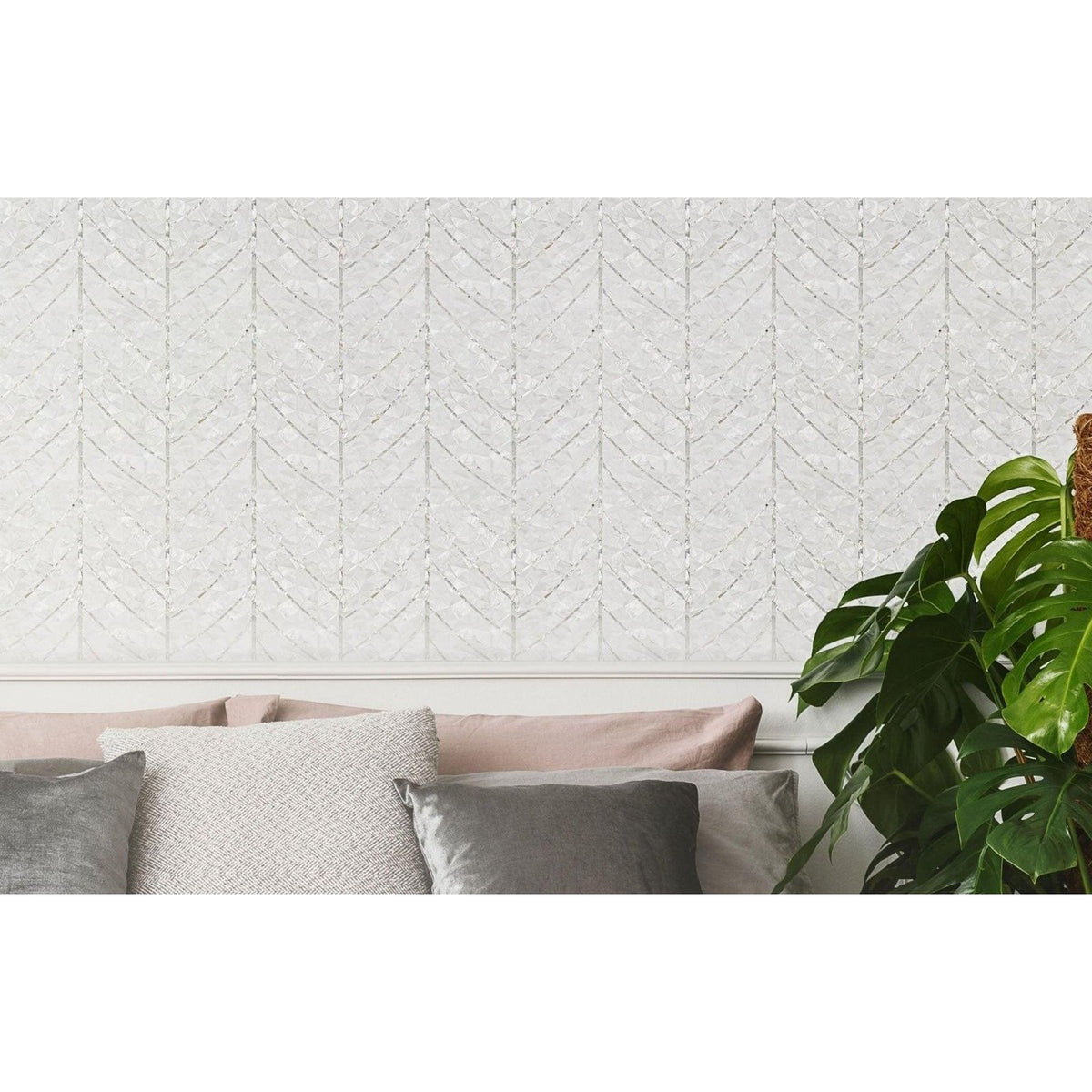 Natures Herringbone white and silver mother-of-pearl herringbone panel with a chevron pattern
