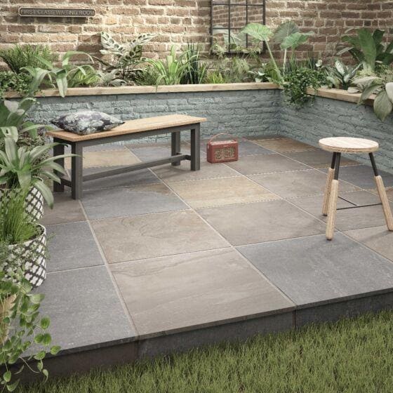 Newby Grey Multi gray stone patio tiles with a natural textured surface for outdoor flooring