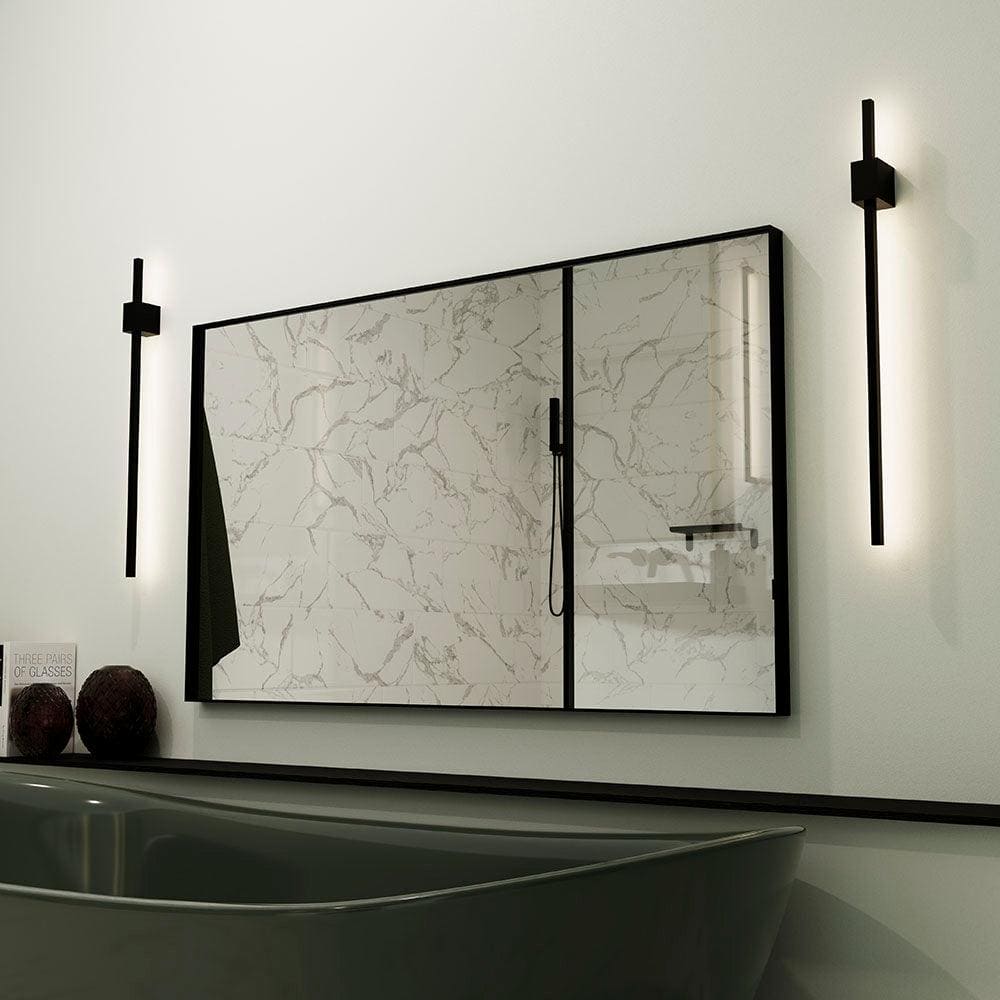 Modern black-framed Newington rectangular mirror with white marble-patterned glass panels and sleek vertical wall sconces