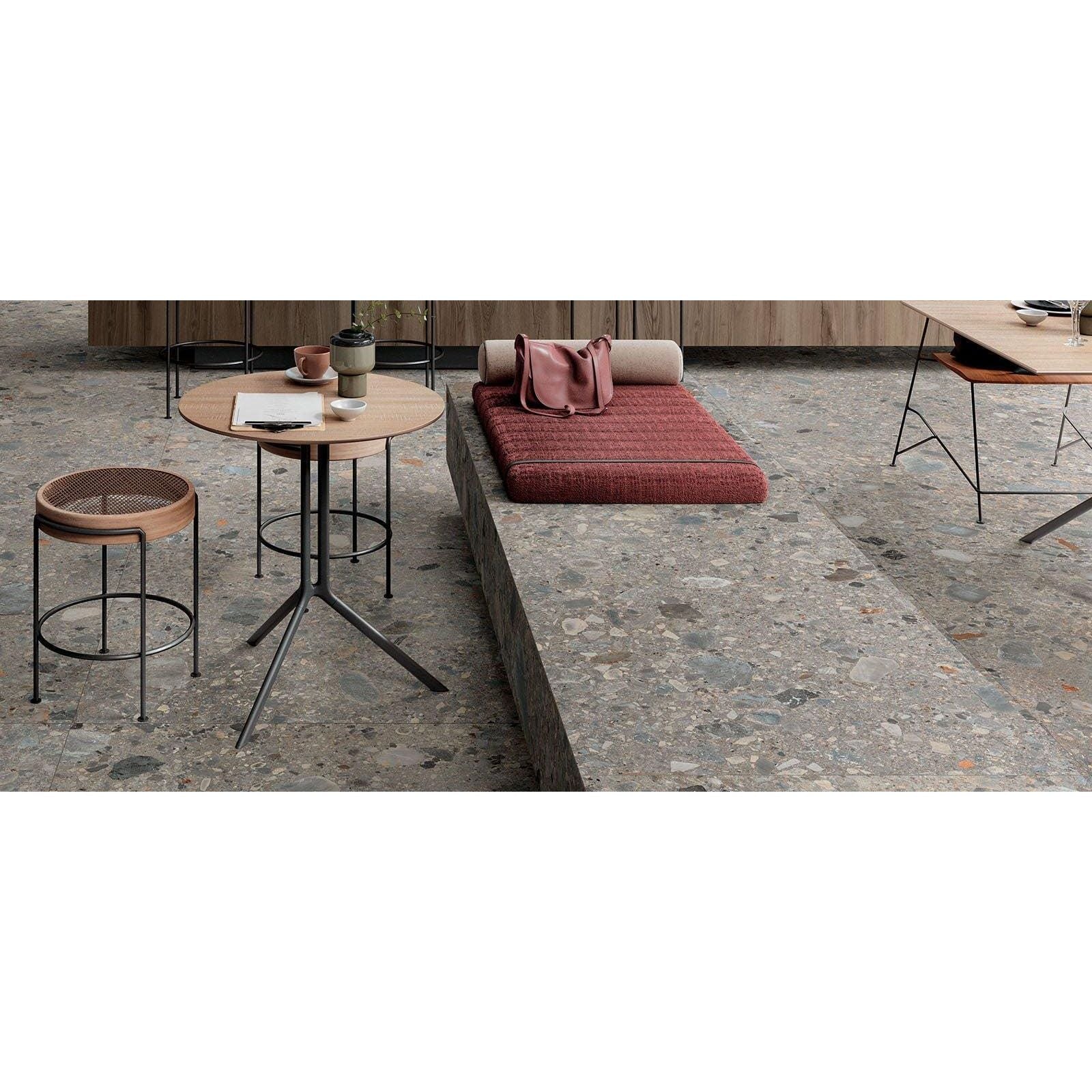 Round wooden table with black metal legs in norway farge matt finish ideal for modern interiors