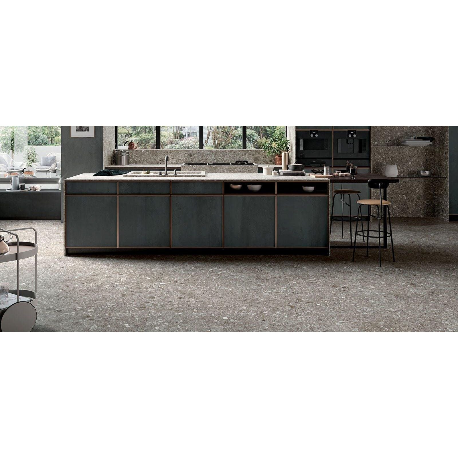 Norway Gra Matt grey terrazzo-effect tiles with a kitchen island and integrated sink