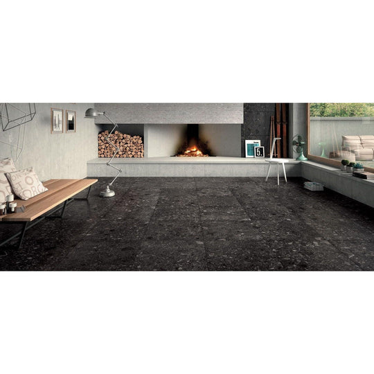 Norway svart matt dark gray stone-effect floor tiles with a speckled textured surface for indoor flooring