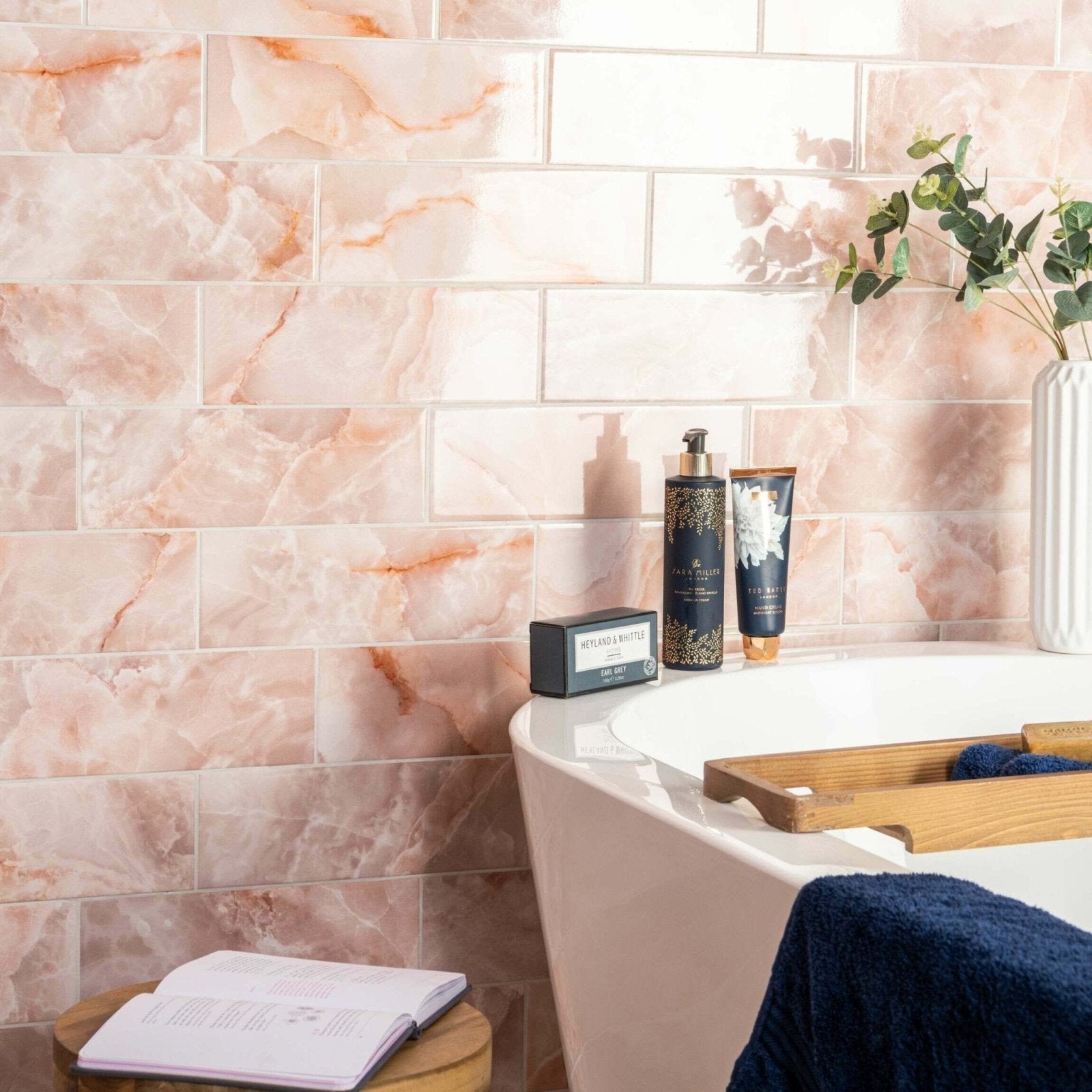 Pink marble-effect subway tiles onix rosa with subtle orange veining ideal for stylish wall coverings