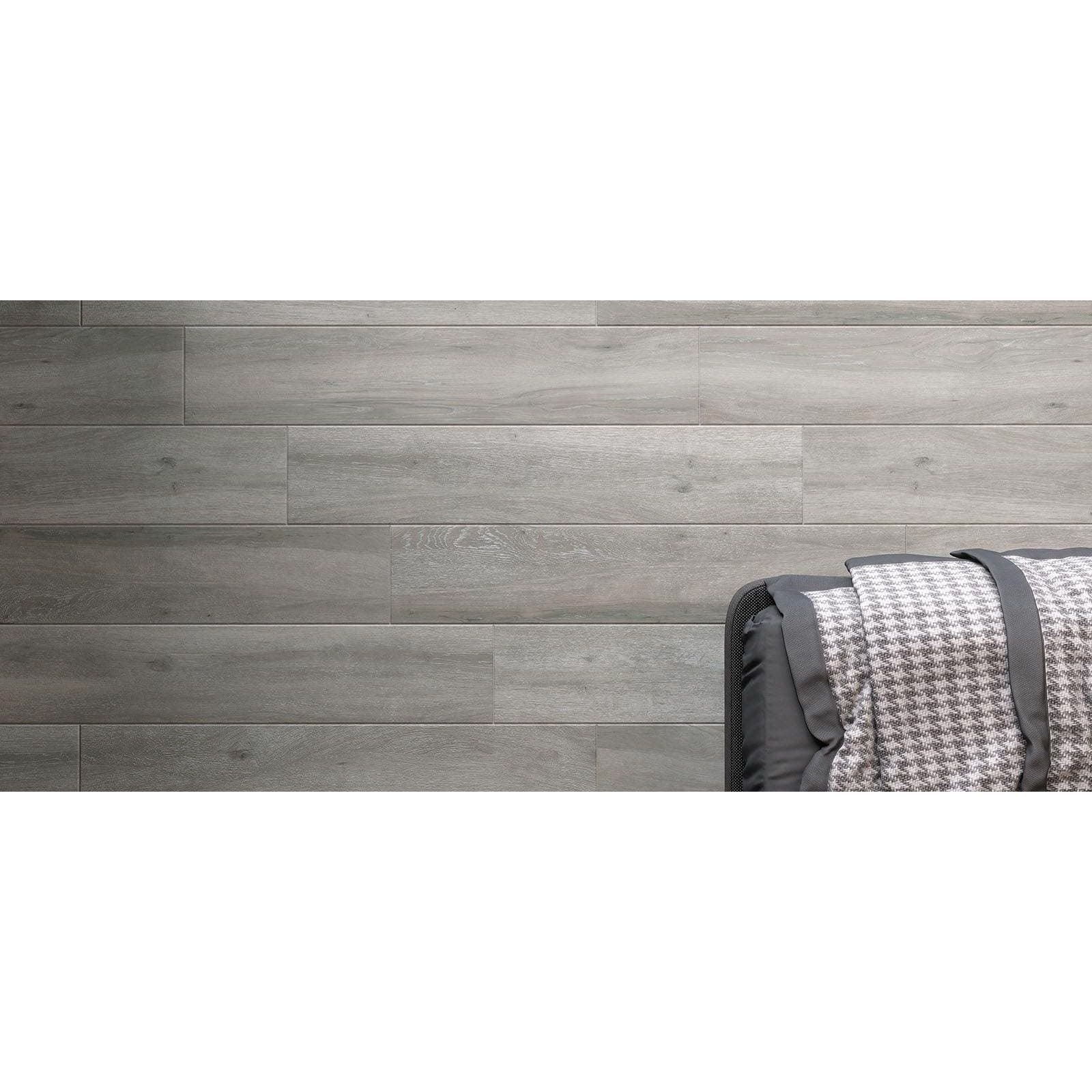 Oslo Pearl Matt gray wood-look laminate flooring with subtle natural grain pattern and durable matte finish