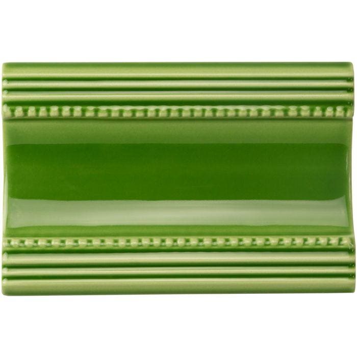 A glossy vibrant green ceramic Palm Green Plain Cornice tile with a classic decorative border design