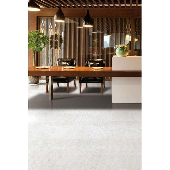 A sleek light gray marble-effect Python Carrara porcelain gloss tile with subtle veining and glossy finish