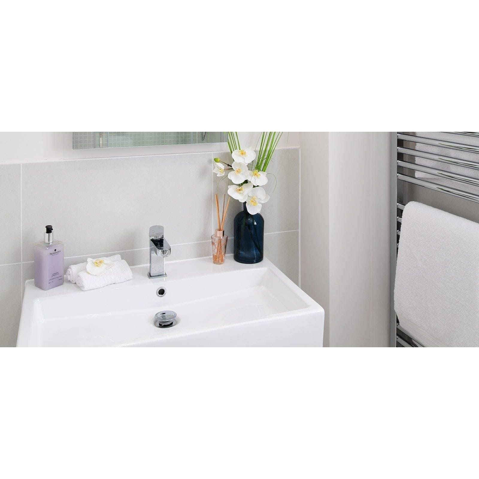 Select Bianco Matt 30 x 60cm white ceramic tiles with a sink and chrome tap