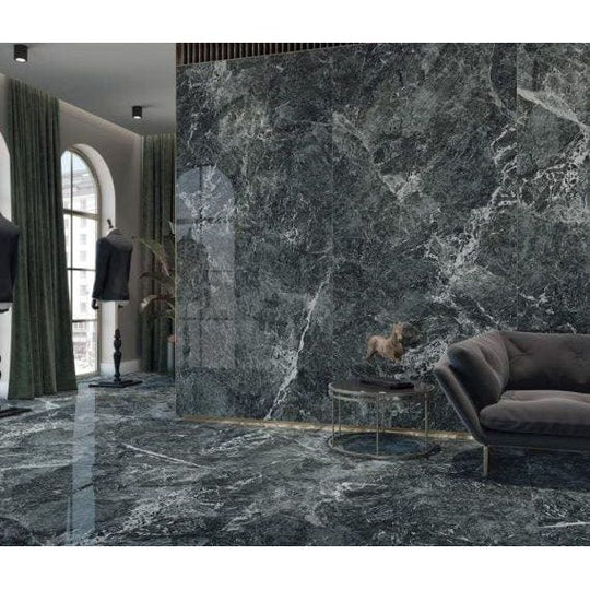 Dark green marble wall with swirling white veining in polished serie saint denis stone panel