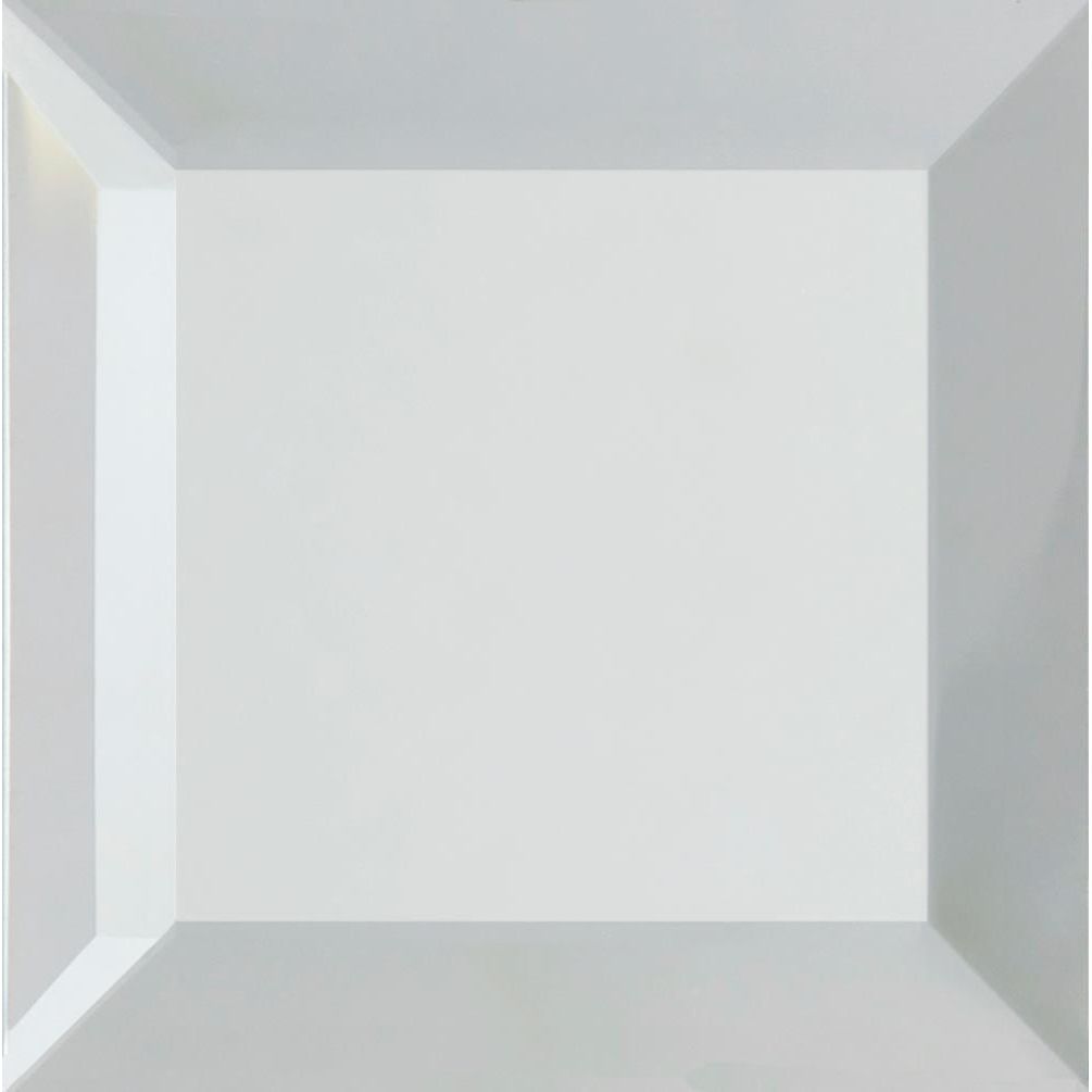 A minimalist white cube silver mirror bevel finishing piece with smooth clean lines and a matte finish