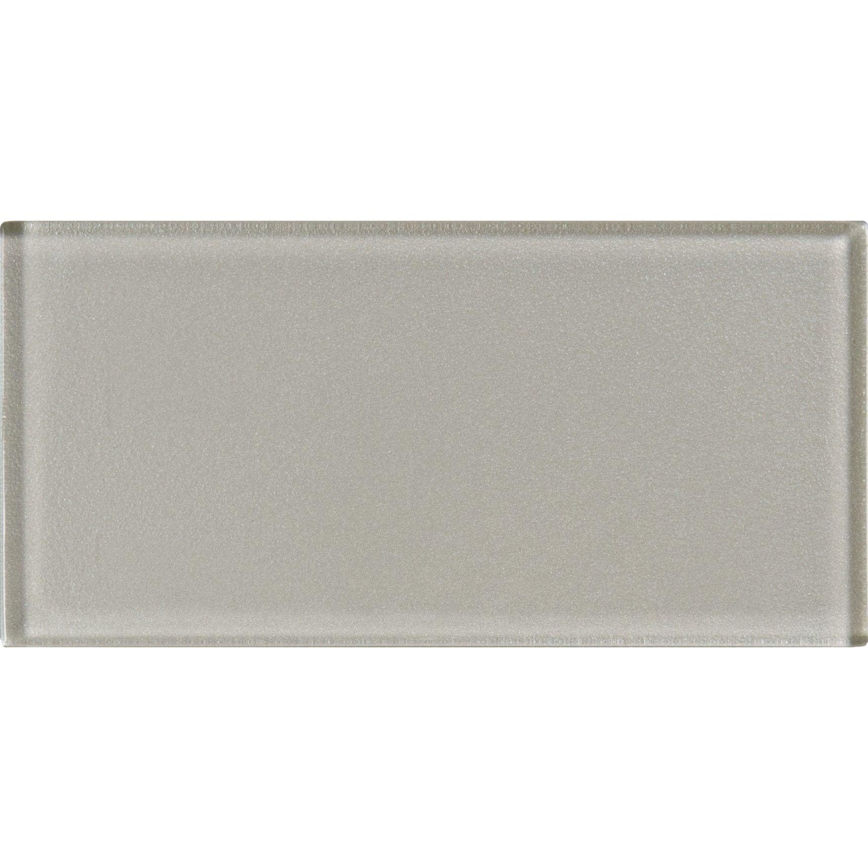 A sleek rectangular glass tile starcia metallica brick in metallic gray with a smooth slightly textured surface