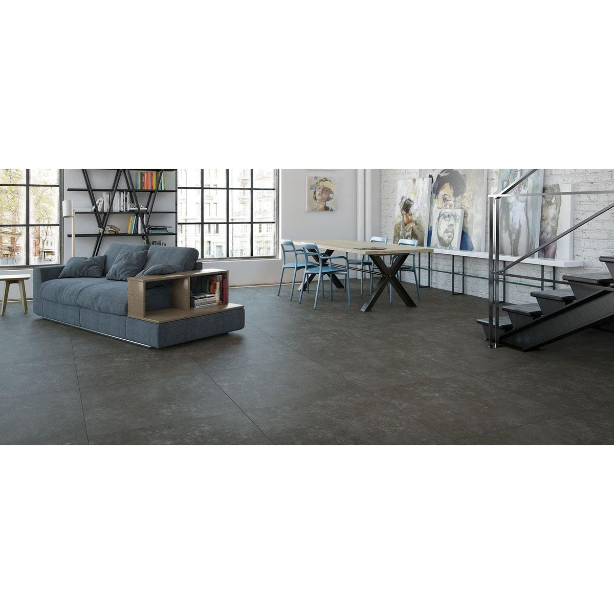 Tanum Plomo Matt 60 x 60cm dark grey concrete-effect tiles with a grey sectional sofa