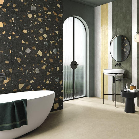 Black terrazzo wall tile with gold and silver flecks from terrazzo colore dark tiles collection