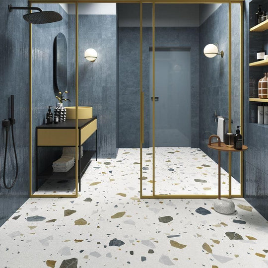 Terrazzo colore light tiles featuring white base with scattered gray black and gold stone fragments floor tiles
