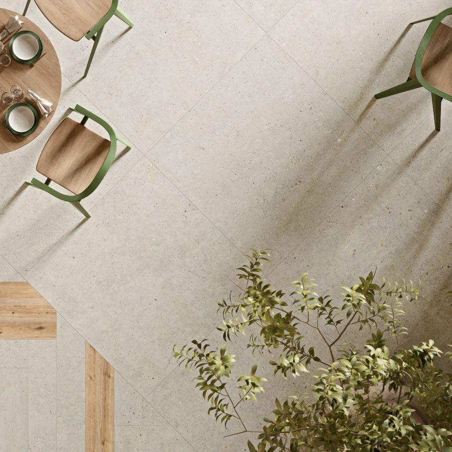 Beige terrazzo coolstone white floor tiles with concrete effect subtle speckles and clean straight grout lines