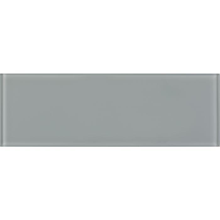 A sleek rectangular glass tile with a smooth matte gray finish thames clear glass 300 x 100mm