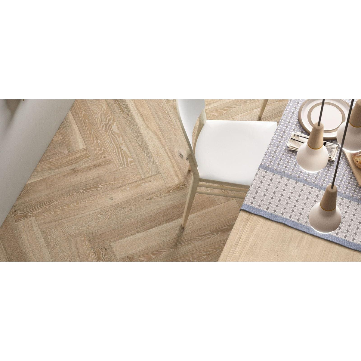 Light-colored wood herringbone floor tiles in tree-charme beige matt finish for elegant interior flooring