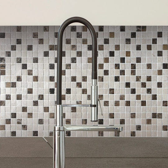 Trip Impkimpi Mosaic black and white marble mosaic with a chrome kitchen tap