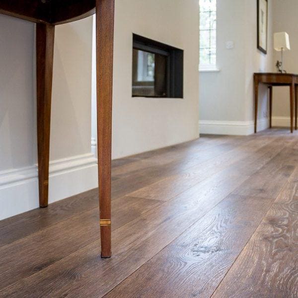 Dark brown hardwood floor with natural wood grain pattern from urban nature tannery brown collection