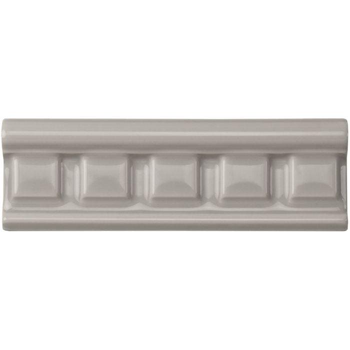 Westminster grey dentil moulding gray ceramic tile with raised rectangular pattern along its center