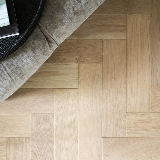 Light oak hardwood floor in a herringbone pattern with ZB204 Shore Drift Oak finish