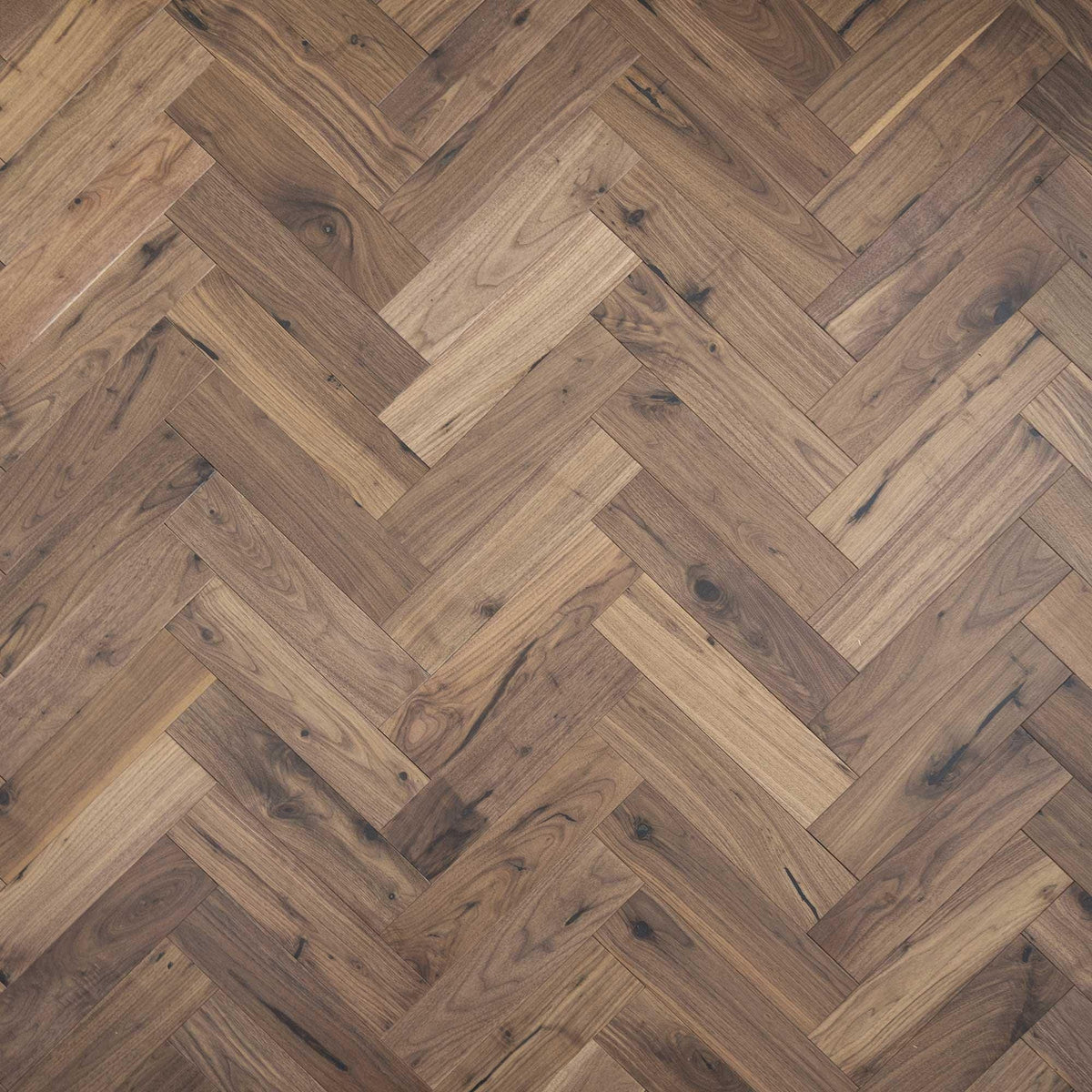 Dark walnut hardwood flooring zb205 black walnut arranged in a herringbone pattern showcasing rich wood texture