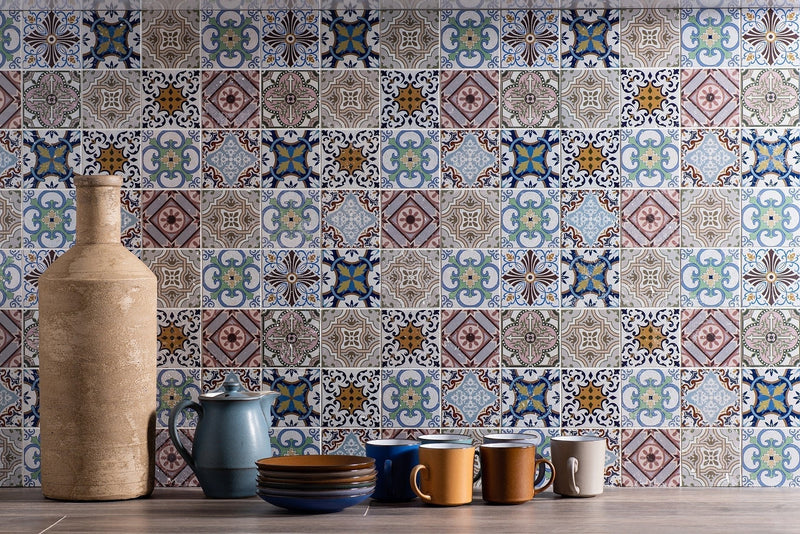 Tall textured beige ceramic vase with narrow neck and wide base featured in how to pick mosaic tiles for every room.