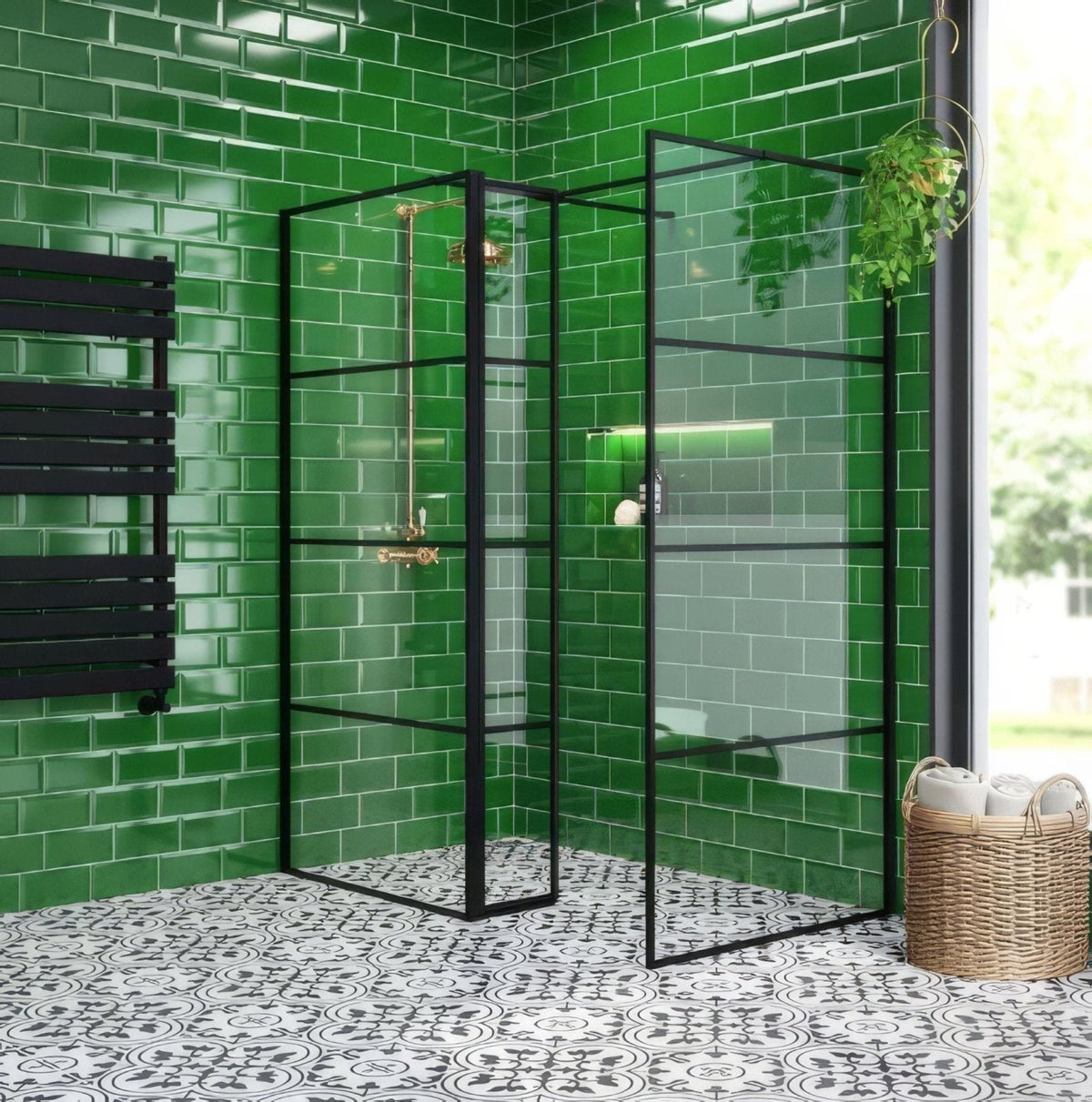 Black-framed glass shower enclosure with gold-toned fixtures against vibrant green matt tiled walls for shower use