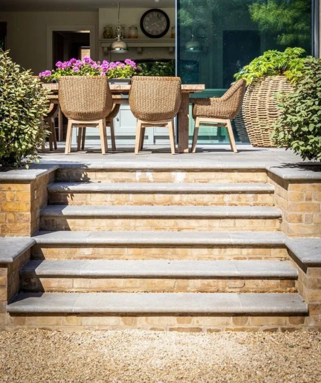 Stone steps with rustic textured finish and warm beige tones perfect for transforming outdoor spaces with durable tiles