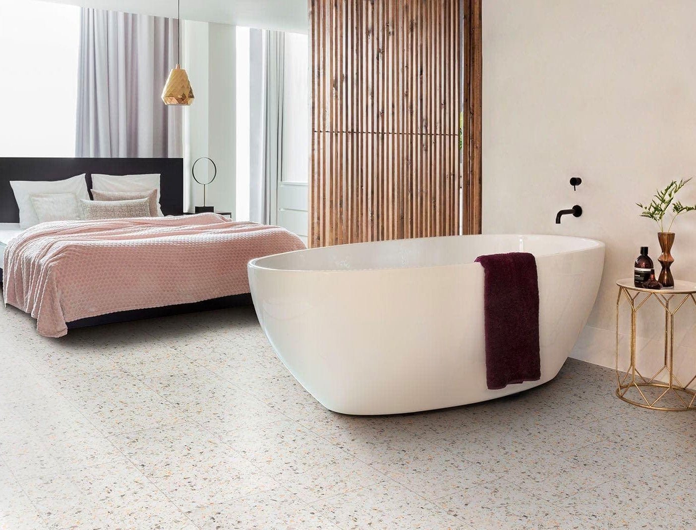 Free-standing white freestanding bathtub with sleek modern design and smooth surface in a home renovation setting