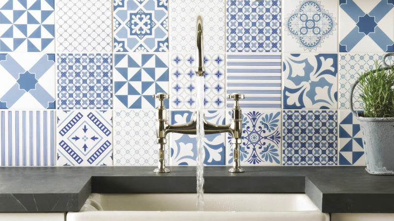 Polished brass traditional-style kitchen faucet with two handles and arched spout in 15 x 15cm wall tiles collection