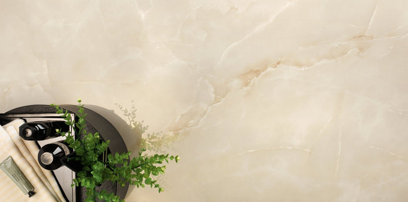Cream-colored marble 60 x 60cm tile with subtle veining ideal for elegant flooring and wall surfaces