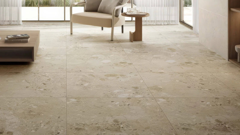 Beige stone-effect floor tiles with a natural textured surface in 90 x 90cm size for durable flooring solutions
