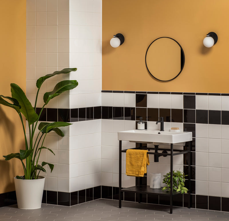 White ceramic sink with black metal frame and shelf from artworks internal field tile collection.