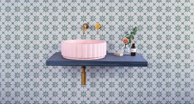 Pink ribbed ceramic vessel sink from the atlas porcelain collection for bathroom use