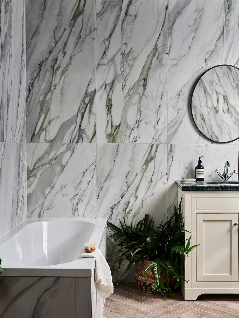 White porcelain bathtub with sleek modern curves and smooth surface from the Palm Springs Porcelain collection