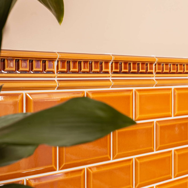 Orange glossy ceramic artworks metro bevelled half tile with decorative border pattern for wall use