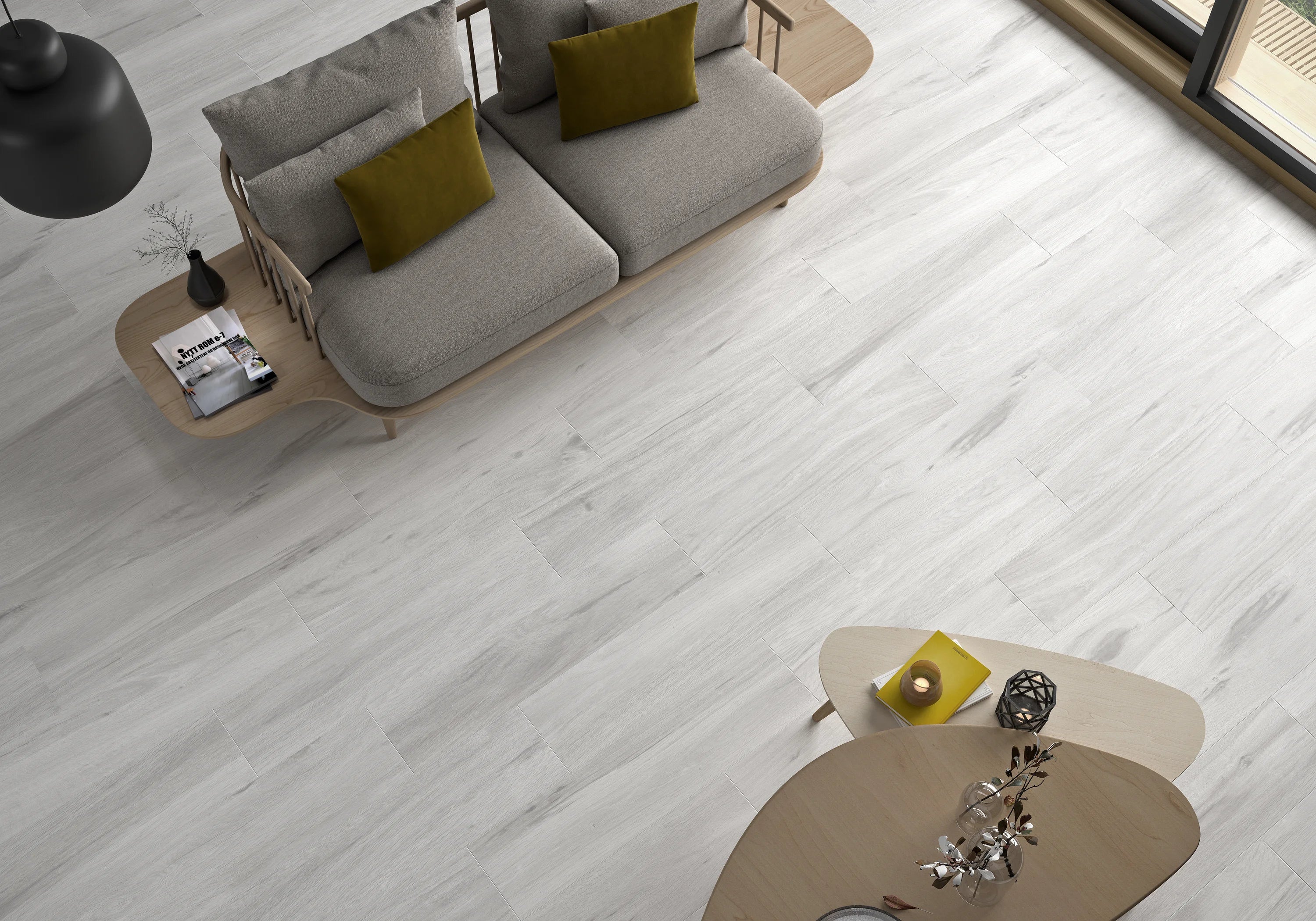 Light gray wood-look floor tiles with subtle white veining from the albero collection for modern interiors