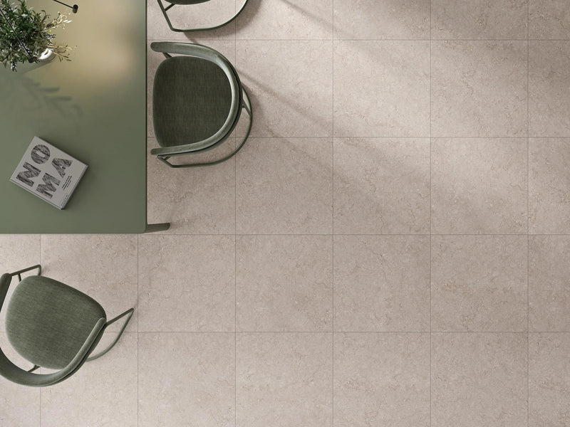 Beige stone effect floor tiles with subtle natural veining from the dual collection for elegant interiors.
