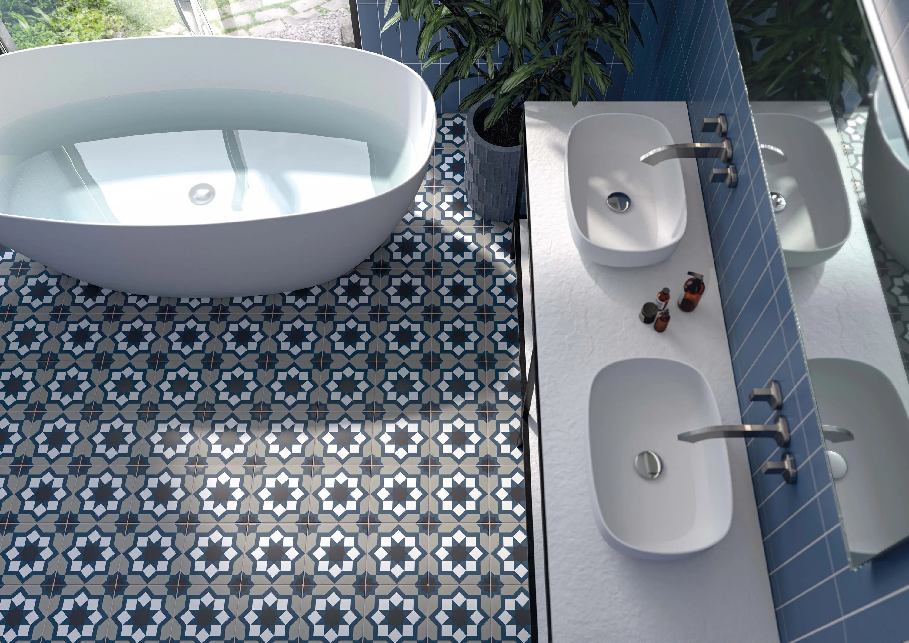 White freestanding bathtub with smooth curved edges and minimalist design from the Hidra collection