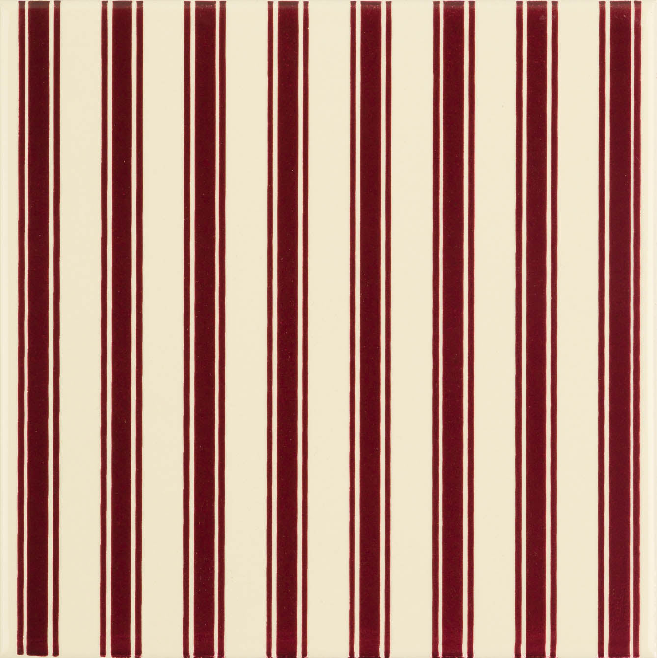 Cream-colored tile with bold vertical burgundy stripes from the regency stripe collection
