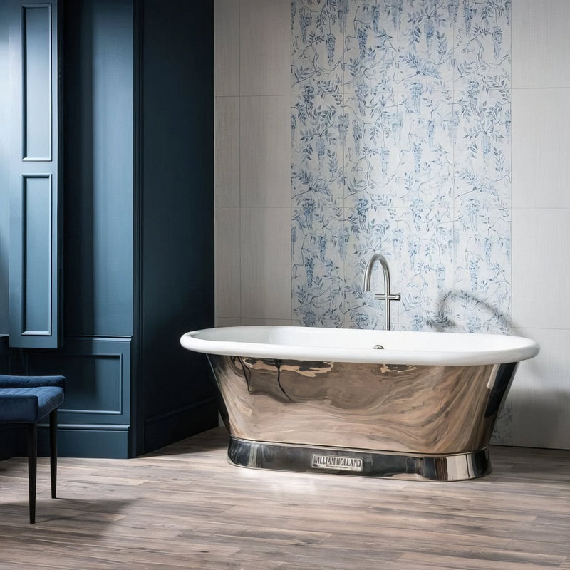A sleek freestanding bathtub with polished copper exterior and white porcelain interior from the Arbour collection