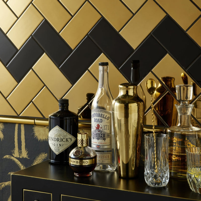 Gold-toned cocktail shaker with a sleek reflective surface and rounded shoulders from artworks gold collection