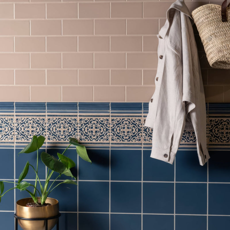 Blue and white patterned ceramic tile border with intricate geometric designs from artworks palladian beige collection
