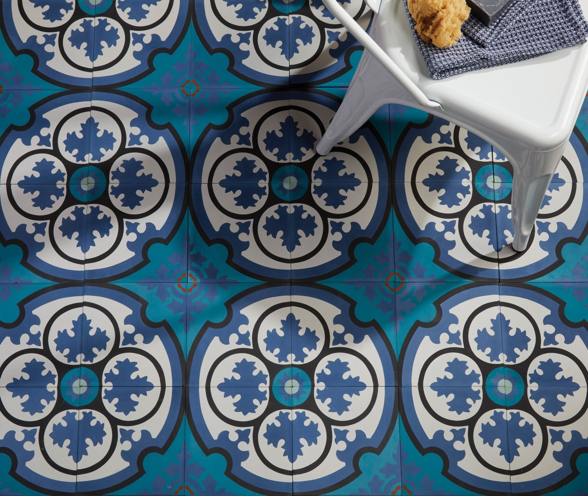 Vibrant blue and white ceramic floor tiles with intricate floral patterns from best selling products collection
