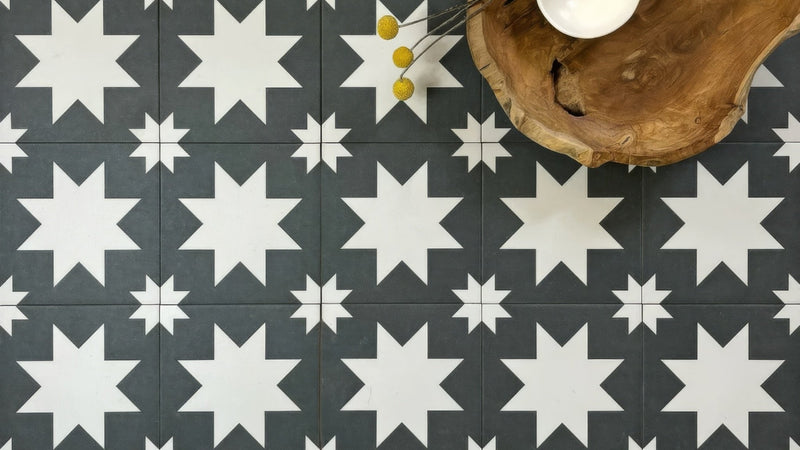 Dark gray and white star-patterned ceramic floor tiles from the black and white floor tiles collection