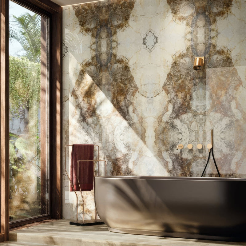 A sleek modern freestanding matte black bathtub showcased with bookmatched porcelain wall tiles.