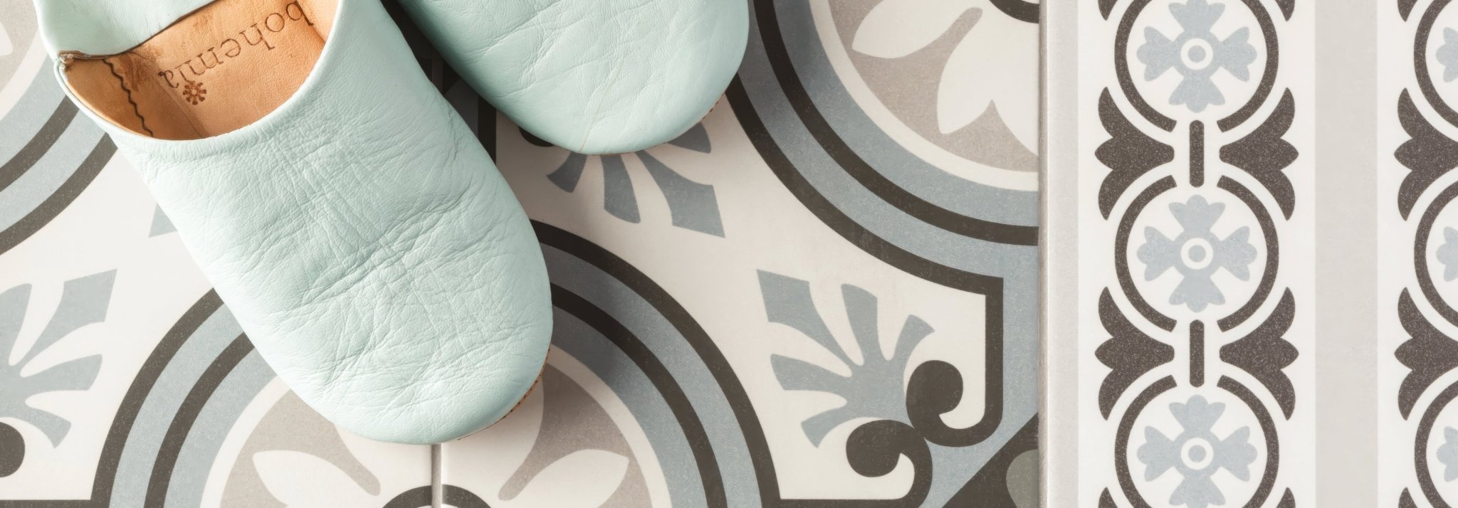 Light blue leather moccasins with soft worn texture and visible brand label inside from the Boulangerie collection
