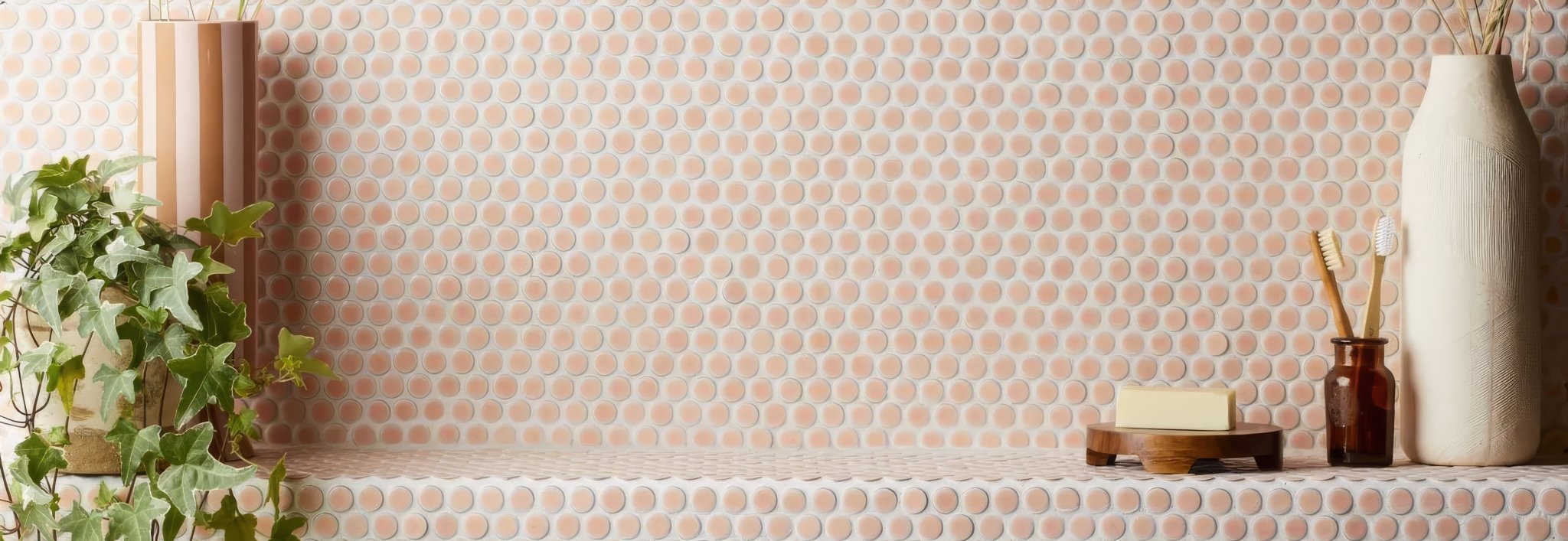 Pink hexagonal ceramic mosaic tile backsplash from the copenhagen tiles collection for kitchen walls